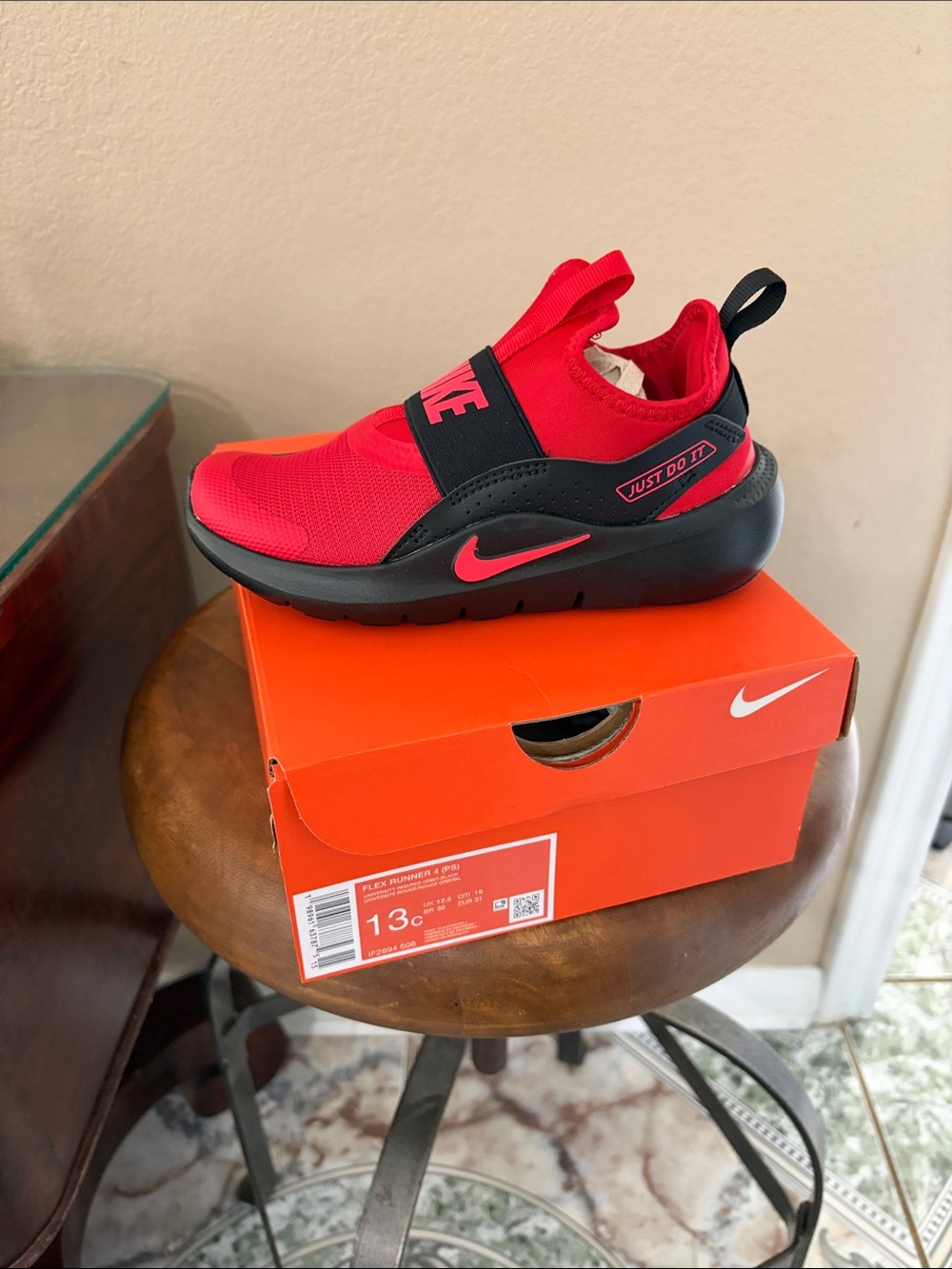 Nike Kids Red and Black Slip-On Runner